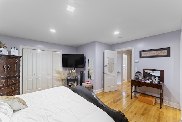 1095 Hope St Unit B, Stamford, CT 06907 - bedroom with light wood-style flooring, baseboards, a closet, and recessed lighting