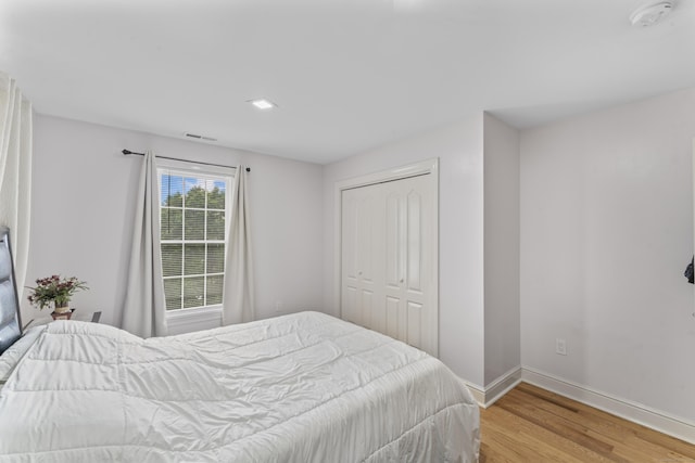 1095 Hope St Unit B, Stamford, CT 06907 - bedroom with wood finished floors, baseboards, and a closet