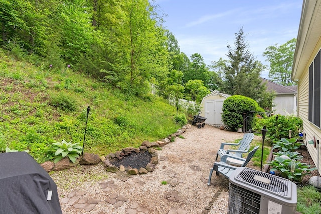 114 Ives Ave, Meriden, CT 06450 - view of yard with a storage shed, an outbuilding, and central AC unit