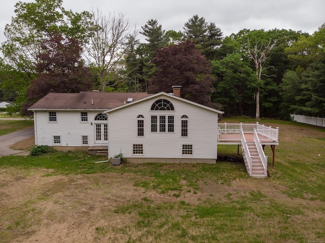 29 Ralph St, Plainfield, CT 06354 - rear view of property with a wooden deck, stairway, french doors, a lawn, and a chimney