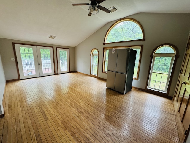 29 Ralph St, Plainfield, CT 06354 - unfurnished living room with light wood-type flooring, ceiling fan, lofted ceiling, and baseboards