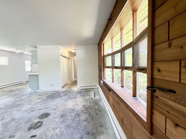 265 Marina Dr, Stratford, CT 06614 - unfurnished living room featuring baseboard heating and a baseboard radiator