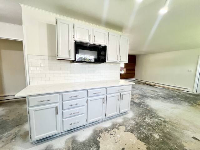 265 Marina Dr, Stratford, CT 06614 - kitchen featuring black microwave, baseboard heating, concrete flooring, decorative backsplash, and white cabinetry