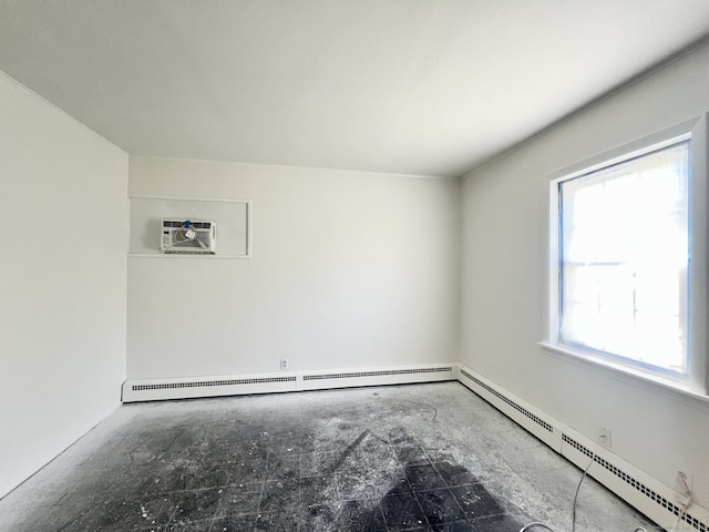 265 Marina Dr, Stratford, CT 06614 - spare room featuring a wall unit AC and a baseboard radiator