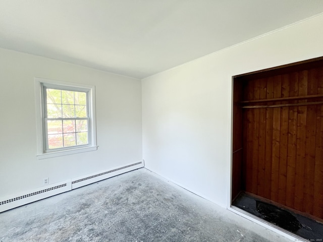 265 Marina Dr, Stratford, CT 06614 - unfurnished bedroom featuring baseboard heating and concrete floors