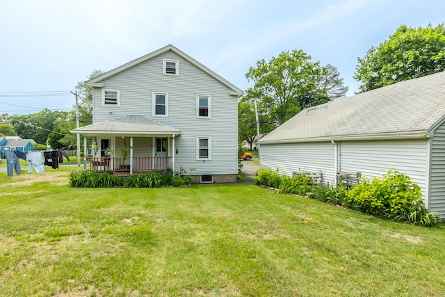 16 Reservoir Rd, Vernon, CT 06066 - rear view of property featuring a yard and covered porch