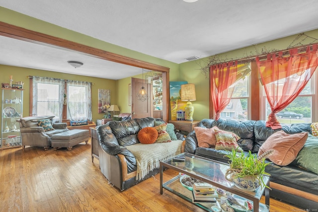16 Reservoir Rd, Vernon, CT 06066 - living room with healthy amount of natural light and hardwood / wood-style flooring
