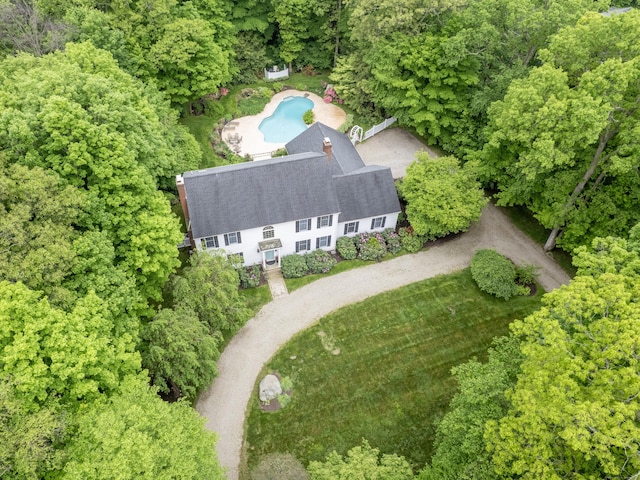 view of subject property featuring a pool