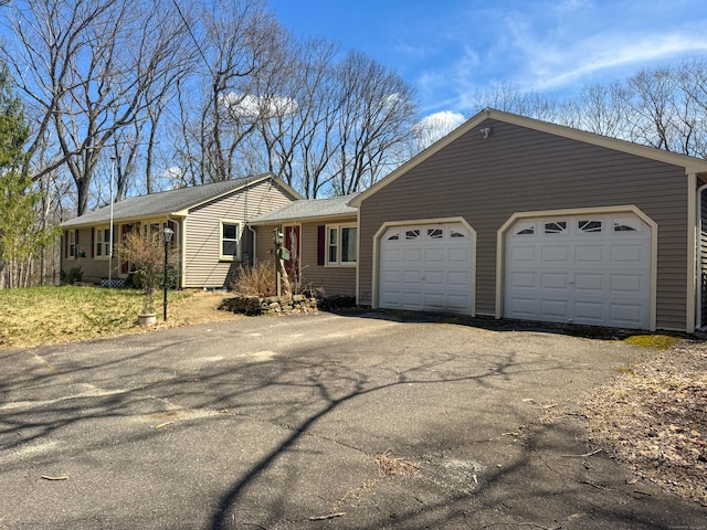 189 Buckley Hwy, Stafford, CT 06076 - ranch-style home featuring driveway and an attached garage