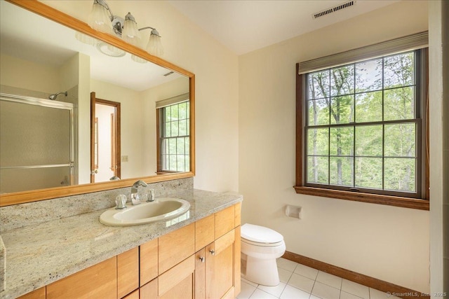 4665 Black Rock Tpke, Fairfield, CT 06824 - bathroom featuring healthy amount of natural light, a shower with door, vanity, and tile patterned flooring