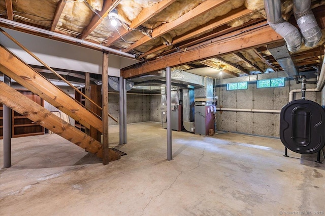 4665 Black Rock Tpke, Fairfield, CT 06824 - basement featuring heating fuel, stairway, and heating unit