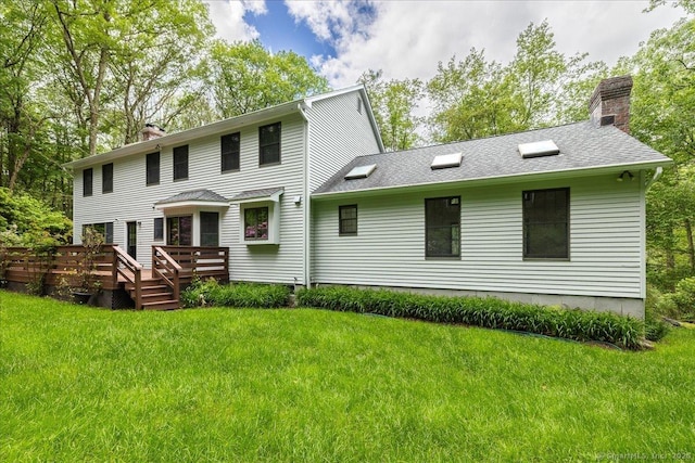 4665 Black Rock Tpke, Fairfield, CT 06824 - back of property featuring a chimney, a yard, and a wooden deck