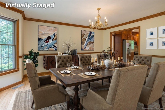 4665 Black Rock Tpke, Fairfield, CT 06824 - dining area with a chandelier, healthy amount of natural light, light wood-style flooring, baseboards, and crown molding