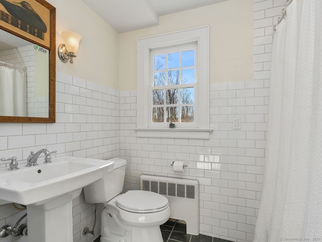 44 Meadow Ridge Dr, Easton, CT 06612 - full bathroom with radiator, tile walls, toilet, tile patterned flooring, and curtained shower