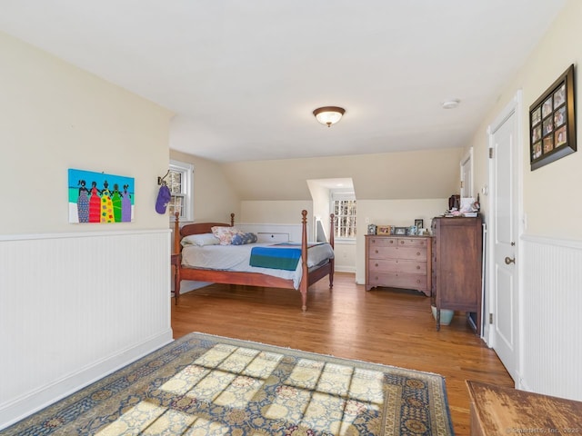 44 Meadow Ridge Dr, Easton, CT 06612 - bedroom with wood finished floors, wainscoting, and lofted ceiling
