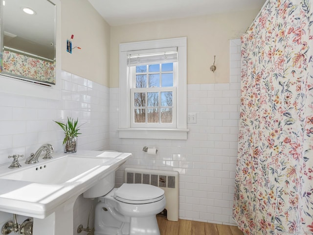 44 Meadow Ridge Dr, Easton, CT 06612 - full bathroom featuring tile walls, radiator heating unit, toilet, a shower with curtain, and wood finished floors