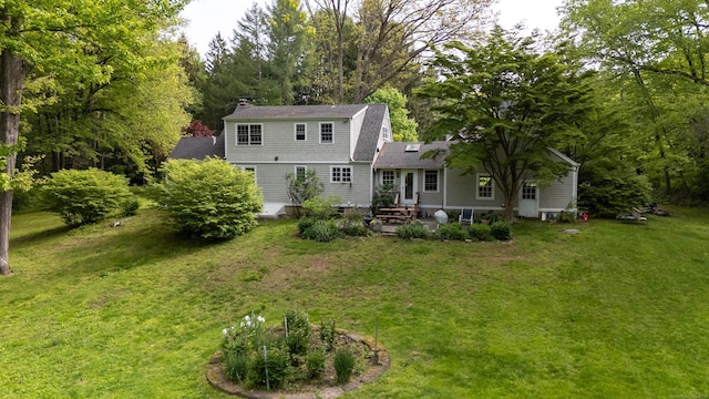44 Meadow Ridge Dr, Easton, CT 06612 - back of property with a lawn, a patio area, entry steps, roof with shingles, and a chimney