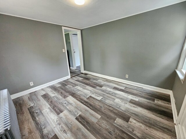 354 Clinton St, New Britain, CT 06053 - spare room with wood finished floors and baseboards