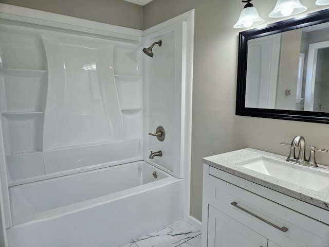 354 Clinton St, New Britain, CT 06053 - full bathroom featuring marble finish floors, washtub / shower combination, vanity, and baseboards