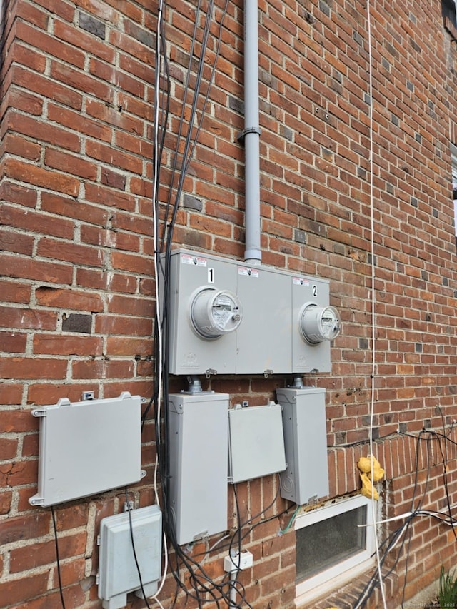 354 Clinton St, New Britain, CT 06053 - exterior view of brick siding and electric meter