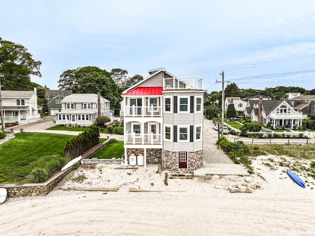22 Shore Rd, East Lyme, CT 06357 - view of front of house with a balcony and a residential view
