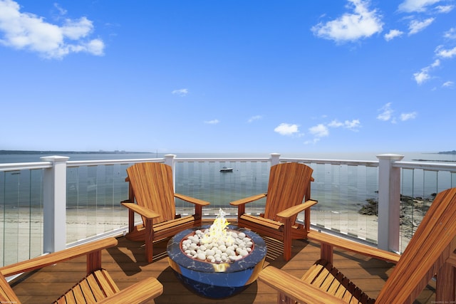 22 Shore Rd, East Lyme, CT 06357 - wooden terrace featuring an outdoor fire pit and a water view