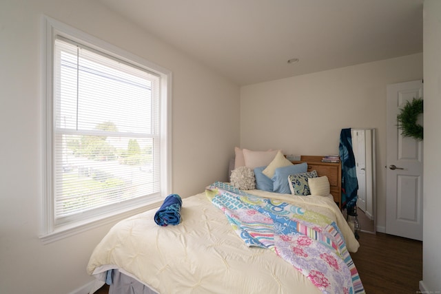 22 Shore Rd, East Lyme, CT 06357 - bedroom with multiple windows and wood finished floors