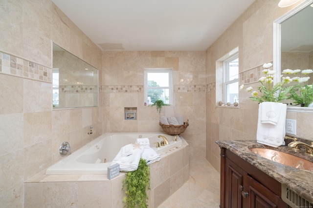 22 Shore Rd, East Lyme, CT 06357 - full bathroom featuring tile walls, a tub with jets, and vanity