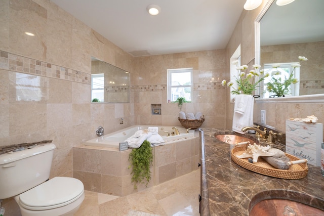 22 Shore Rd, East Lyme, CT 06357 - bathroom with tile walls, a bath, and double vanity