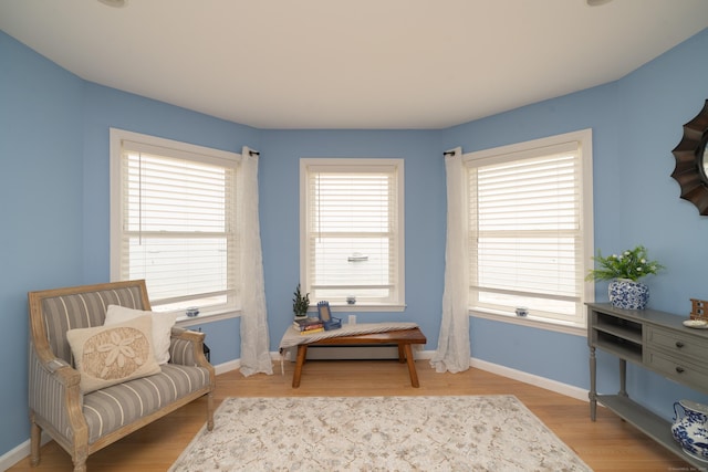 22 Shore Rd, East Lyme, CT 06357 - sitting room with baseboards and wood finished floors