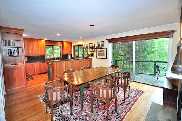 21 Bexley Ct, Goshen, CT 06756 - dining area featuring a chandelier, plenty of natural light, light wood-style floors, recessed lighting, and ornamental molding
