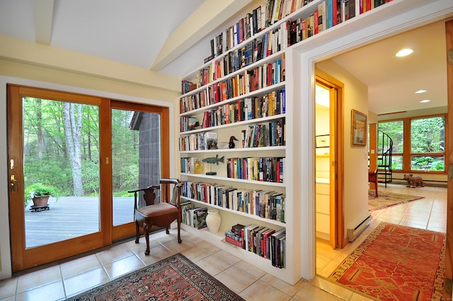 21 Bexley Ct, Goshen, CT 06756 - sitting room with a baseboard radiator, tile patterned flooring, bookshelves, built in features, and recessed lighting