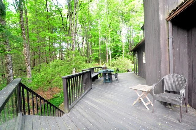 21 Bexley Ct, Goshen, CT 06756 - wooden deck featuring outdoor dining area and a wooded view