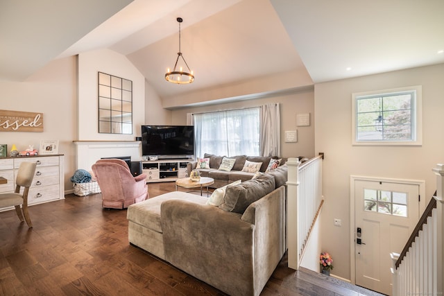 20 Jeffrey Ln, Southington, CT 06451 - living area featuring a chandelier, dark wood-style flooring, and vaulted ceiling