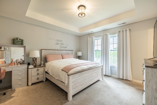 20 Jeffrey Ln, Southington, CT 06451 - bedroom featuring light carpet, a tray ceiling, and baseboards