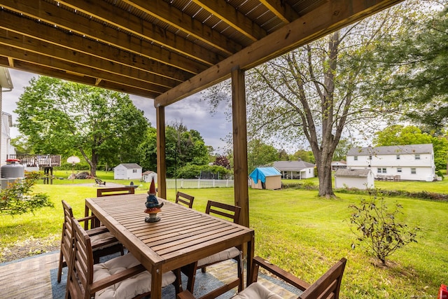 20 Jeffrey Ln, Southington, CT 06451 - view of patio / terrace with a storage unit, outdoor dining space, and an outdoor structure