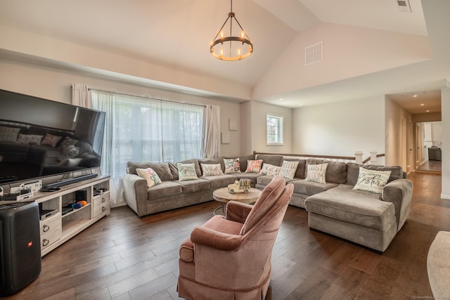 20 Jeffrey Ln, Southington, CT 06451 - living room with a chandelier, dark wood finished floors, and high vaulted ceiling