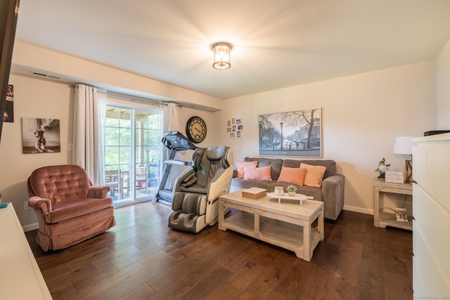 20 Jeffrey Ln, Southington, CT 06451 - living area with dark wood-style flooring and baseboards