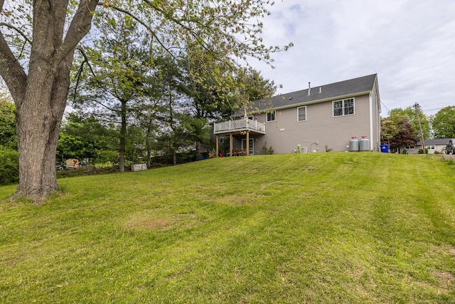 20 Jeffrey Ln, Southington, CT 06451 - back of property featuring a lawn and a wooden deck