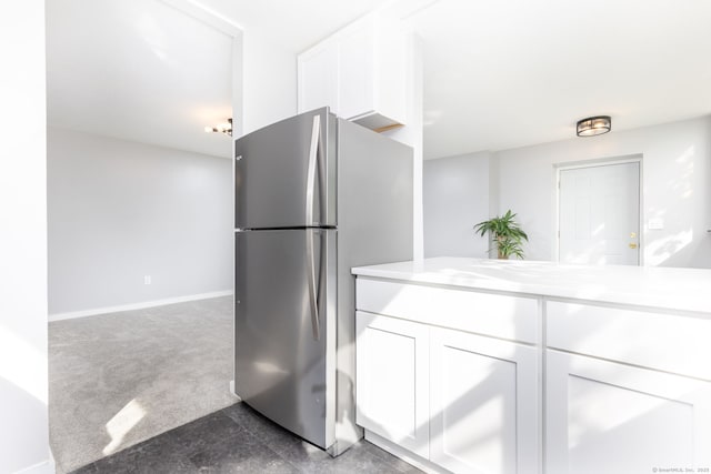 201 College St Unit 3, Middletown, CT 06457 - kitchen featuring freestanding refrigerator, white cabinetry, light countertops, carpet, and baseboards
