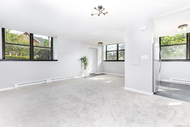 201 College St Unit 3, Middletown, CT 06457 - spare room with a baseboard heating unit, carpet flooring, and a chandelier