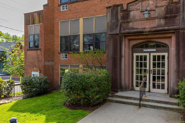 201 College St Unit 3, Middletown, CT 06457 - view of exterior entry with brick siding and french doors