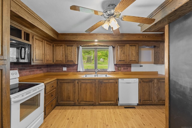 114 Wildwood Rd, East Haddam, CT 06415 - kitchen with white appliances, a sink, open shelves, and brown cabinetry