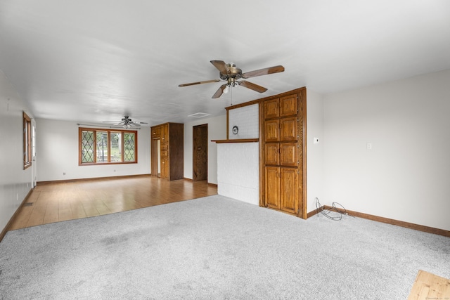 114 Wildwood Rd, East Haddam, CT 06415 - unfurnished living room featuring carpet, ceiling fan, and baseboards