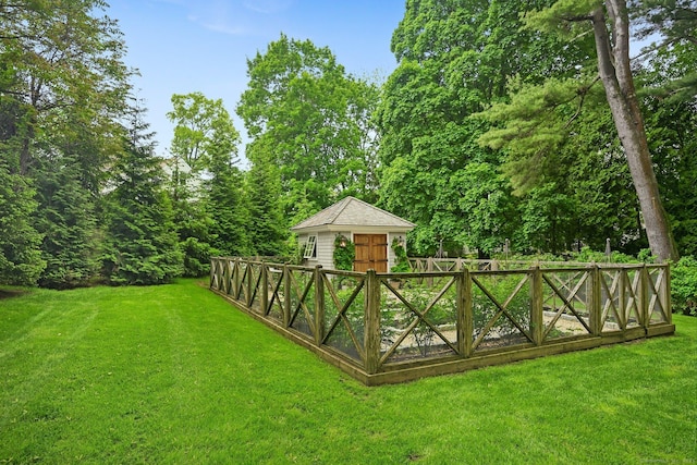 4 Budner Ln, Westport, CT 06880 - view of green lawn with an outdoor structure