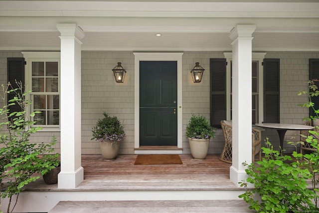 4 Budner Ln, Westport, CT 06880 - view of exterior entry with a porch