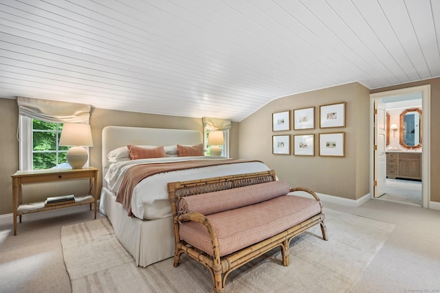 4 Budner Ln, Westport, CT 06880 - bedroom with light carpet, vaulted ceiling, baseboards, wood ceiling, and ensuite bathroom