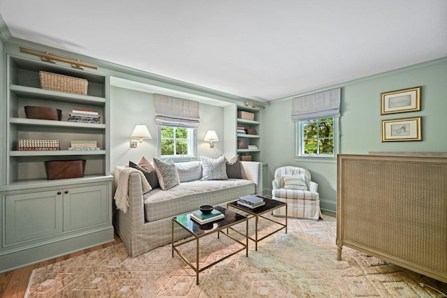 4 Budner Ln, Westport, CT 06880 - living area featuring wood finished floors, built in shelves, and baseboards