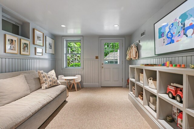 4 Budner Ln, Westport, CT 06880 - carpeted living room with wainscoting and recessed lighting