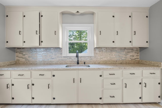 291 Maple Hill Rd, Naugatuck, CT 06770 - kitchen featuring a sink and decorative backsplash